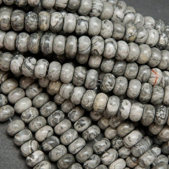Swirling patterned silver lace agate rondelle beads.