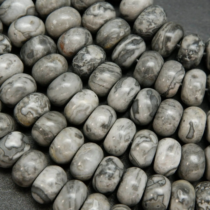 Swirling patterned silver lace agate rondelle beads.