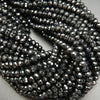 Faceted black tourmaline beads.