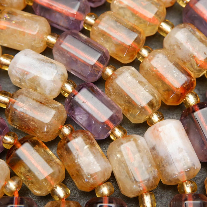 Yellow and purple citrine and ametrine beads.Yellow and purple citrine and ametrine beads.