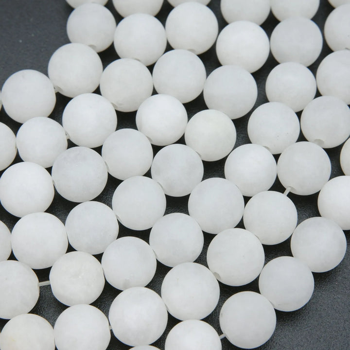 Round Matte Finish White Jade Beads.