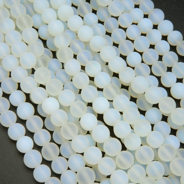 White matte finish manmade opalite beads.