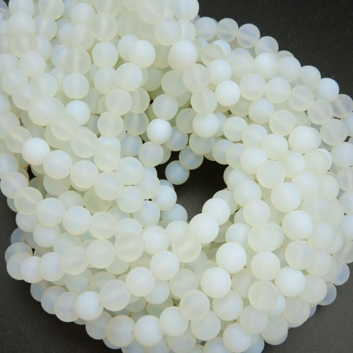 White matte finish manmade opalite beads.