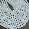 White matte finish manmade opalite beads.