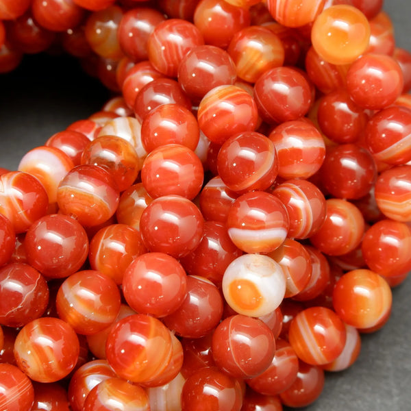 Red sardonyx banded agate beads.