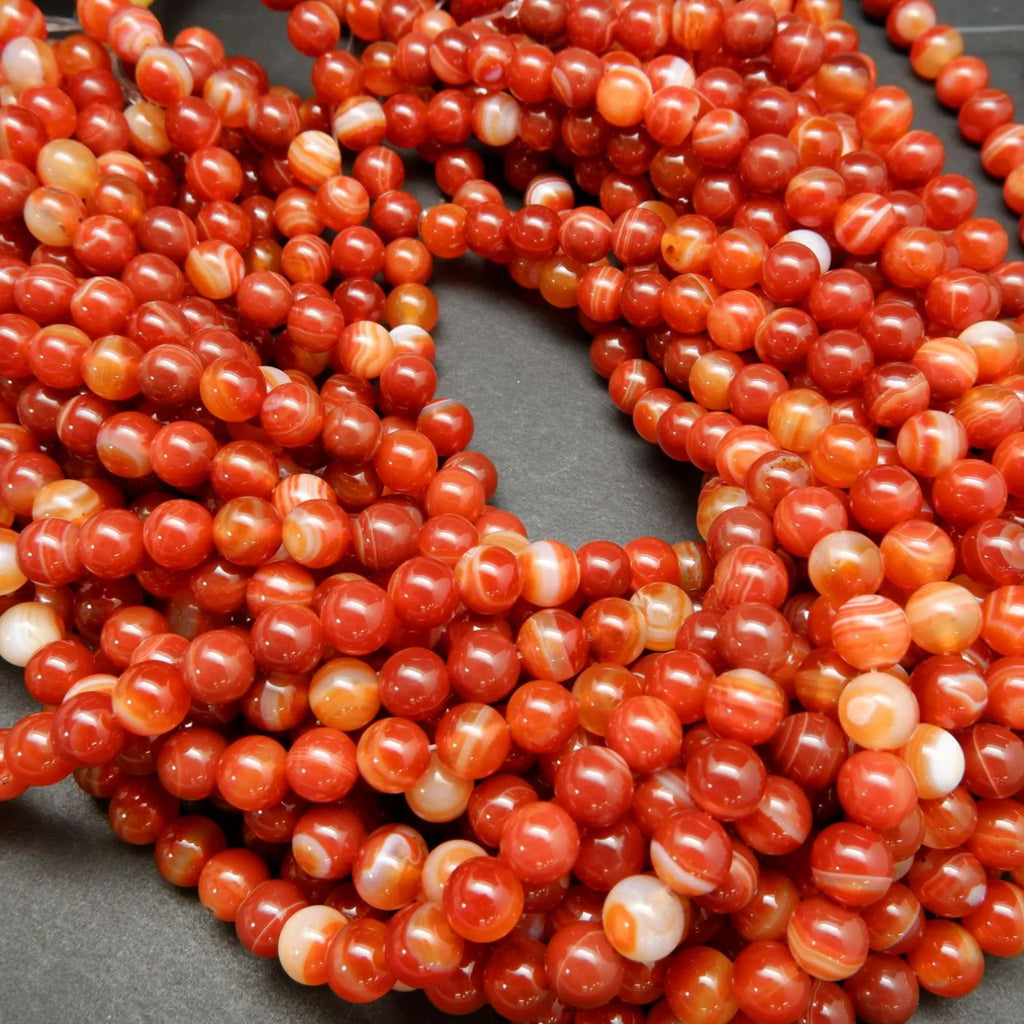 Red sardonyx banded agate beads.