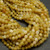 African yellow opal beads.