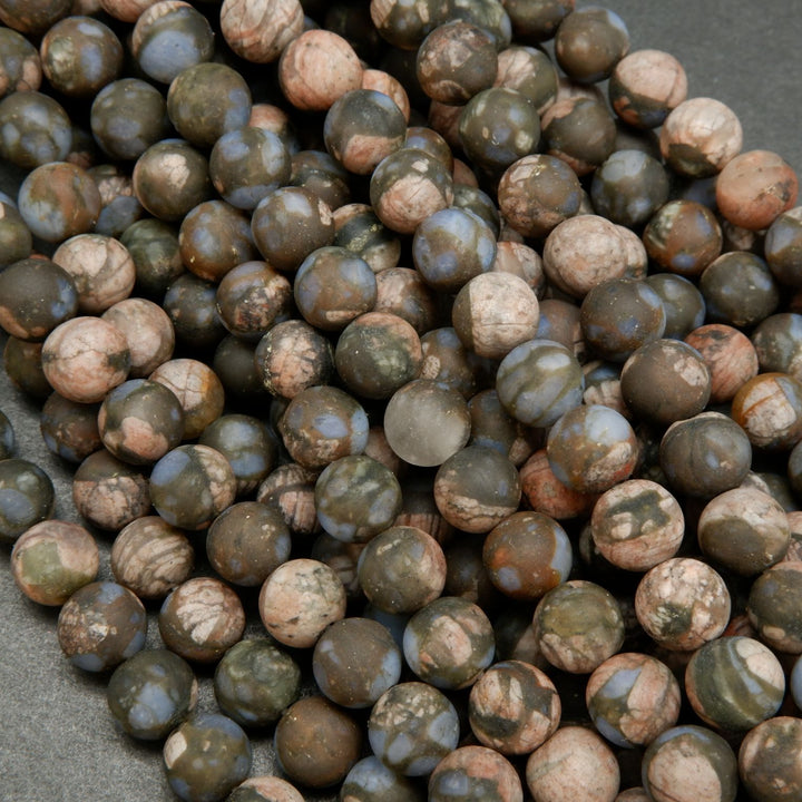 Brown and Pink Rhyolite Loose Beads From Texas.