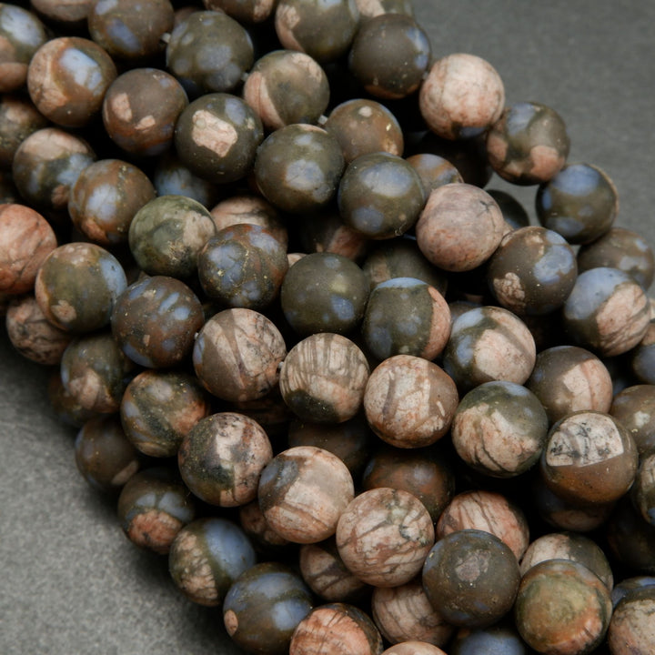 Brown and Pink Rhyolite Loose Beads From Texas.
