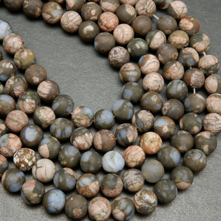 Brown and Pink Rhyolite Loose Beads From Texas.