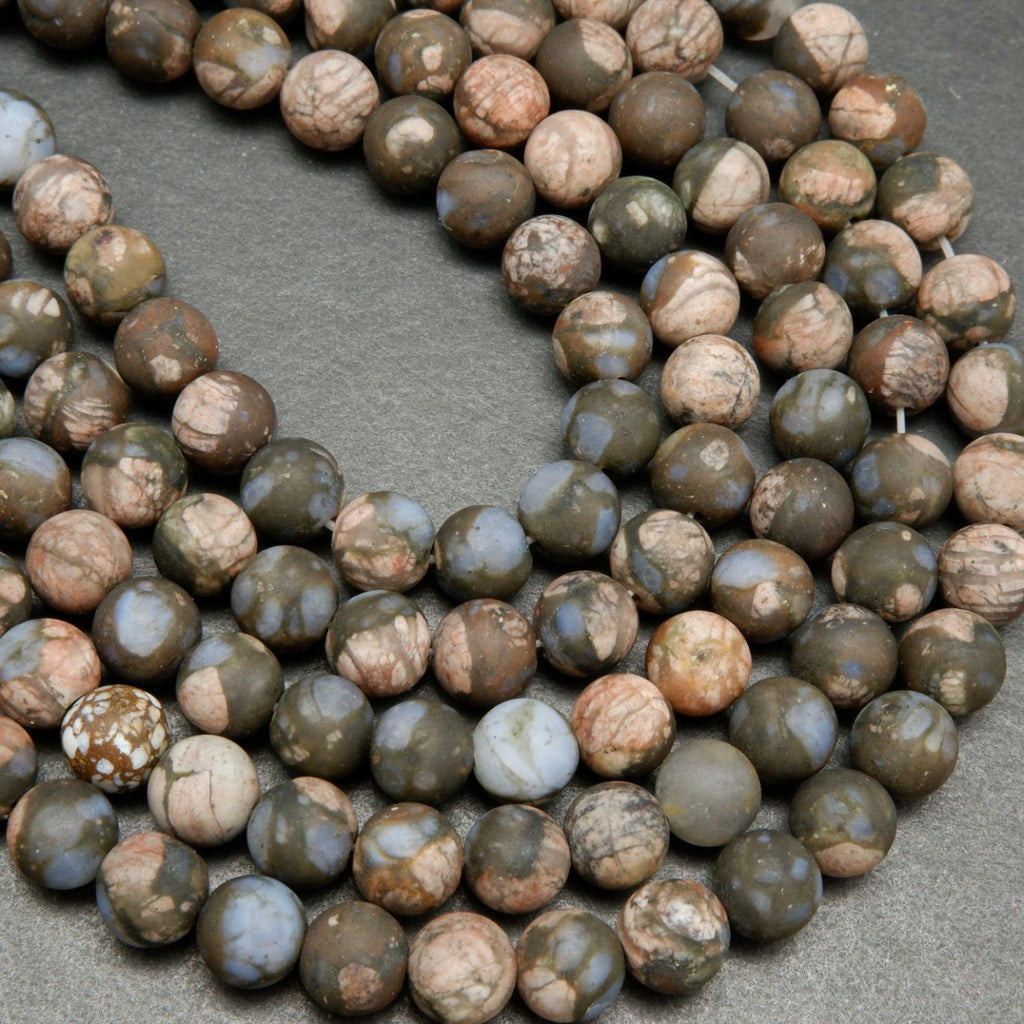 Brown and Pink Rhyolite Loose Beads From Texas.