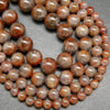 Natural Auralite 23 round loose beads.
