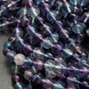 Green and purple fluorite beads.