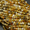 Dendritic yellow opal beads.