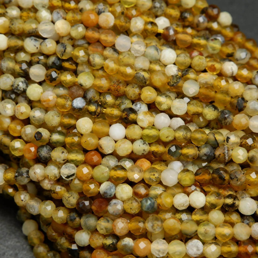 Dendritic yellow opal beads.