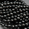 Faceted black onyx beads.