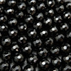 Faceted black onyx beads.