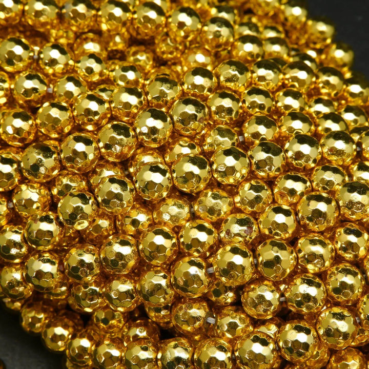 Faceted bright gold hematite beads.