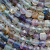 Multicolor faceted cube shape beads.