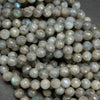 Faceted grey labradorite beads.