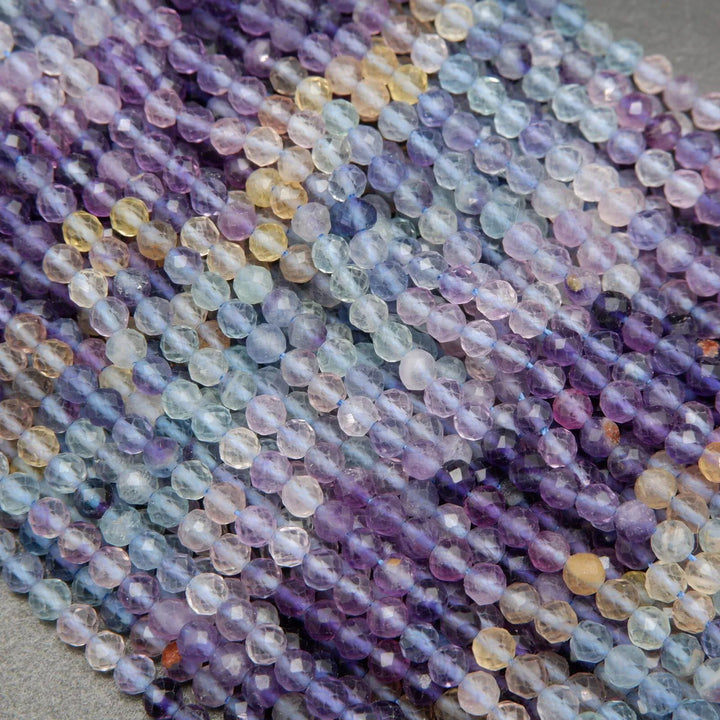 Purple, yellow, green, and blue fluorite beads.