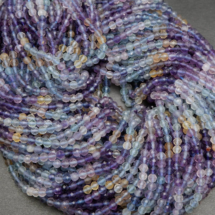 Purple, yellow, green, and blue fluorite beads.