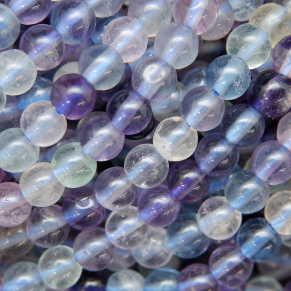 Multicolor Fluorite Polished Round Beads.
