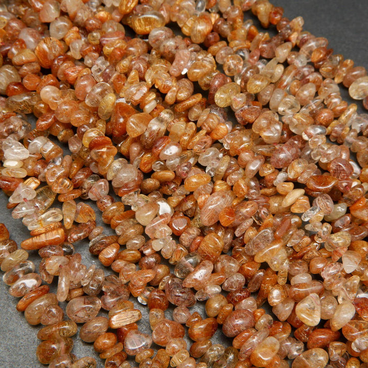 Brown rutilated quartz beads.