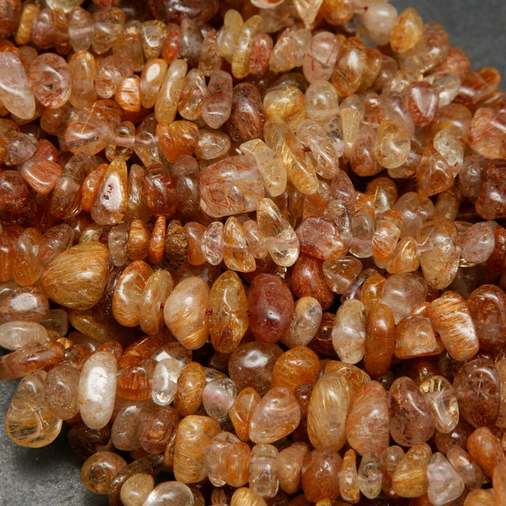 Brown rutilated quartz beads.