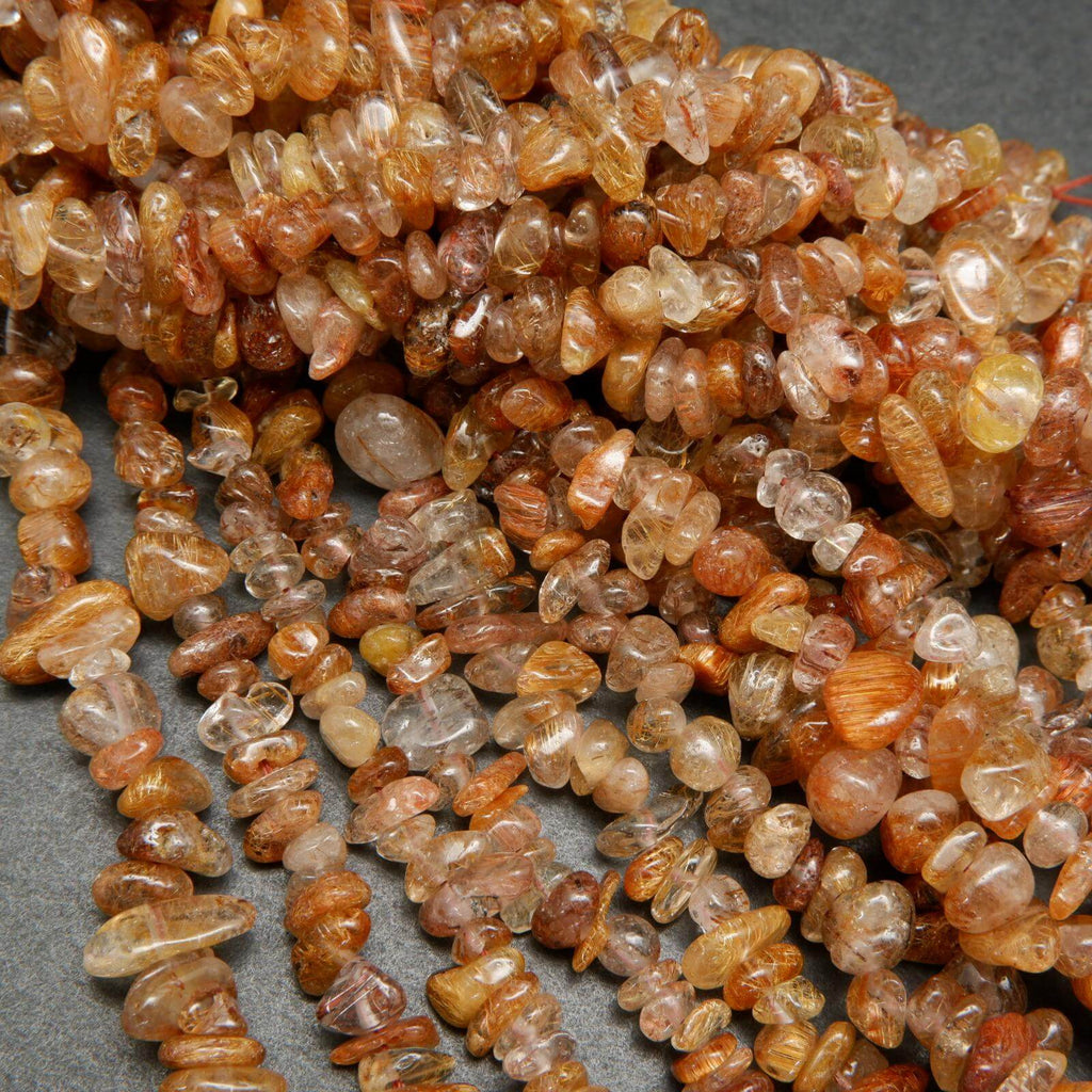 Brown rutilated quartz beads.