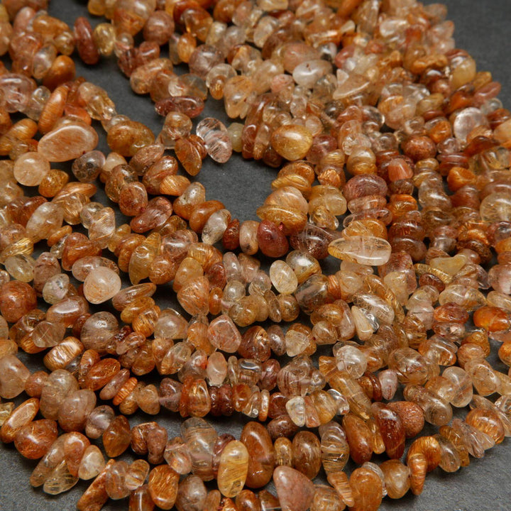 Brown rutilated quartz beads.