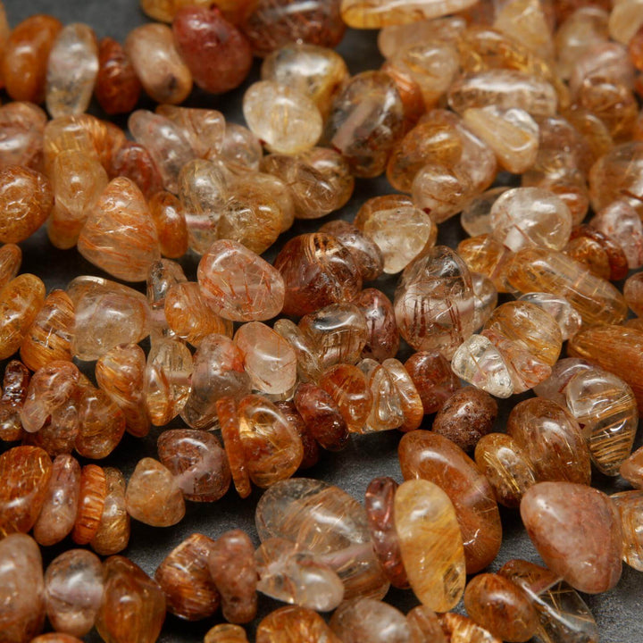 Brown rutilated quartz beads.