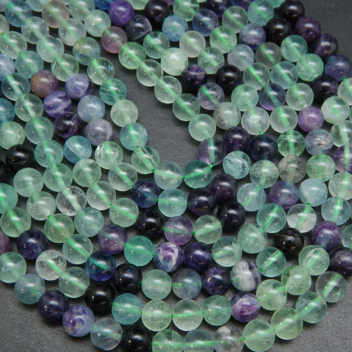 Round green and purple fluorite beads for jewelry making
