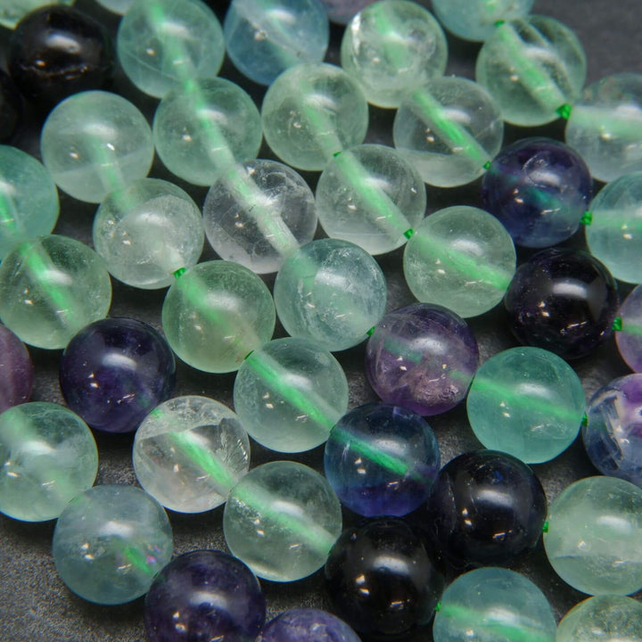 Round green and purple fluorite beads for jewelry making