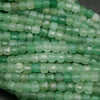 Green aventurine beads. Green cube shape faceted loose beads.