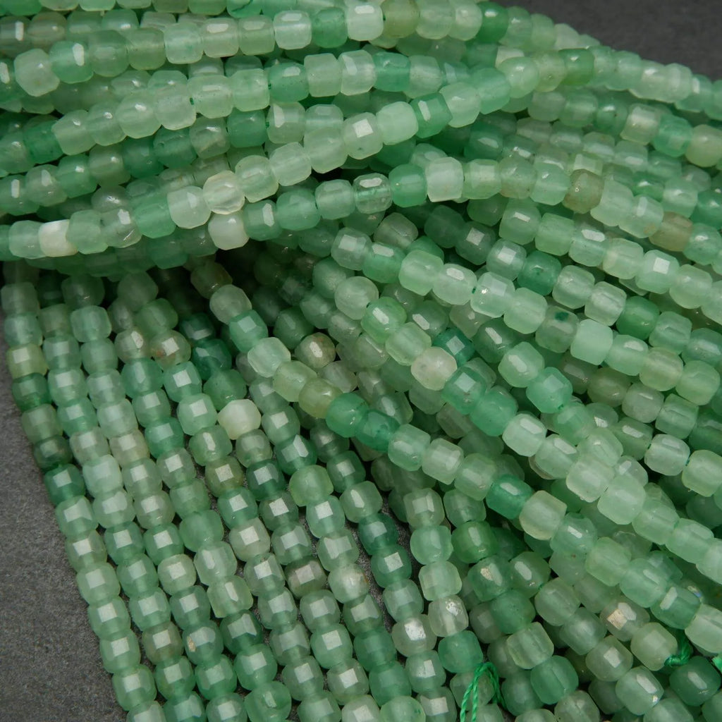 Green aventurine beads. Green cube shape faceted loose beads.