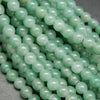 Light green large hole green aventurine beads.