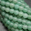 Light green large hole green aventurine beads.