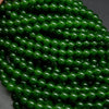 Dyed green jade beads.