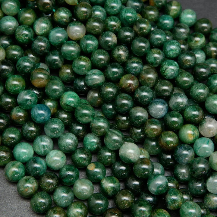 Green mica round smooth polished beads.