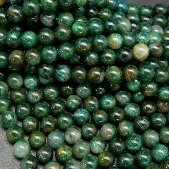 Green mica round smooth polished beads.