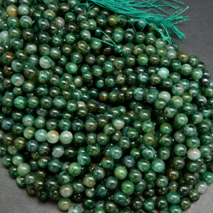 Green mica round smooth polished beads.