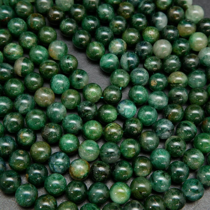 Green mica round smooth polished beads.