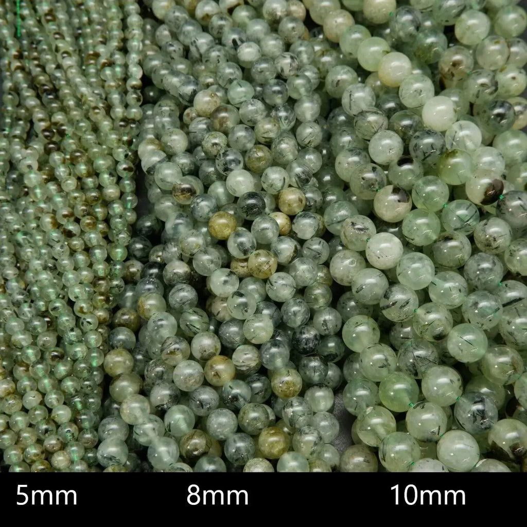Green Prehnite Beads With Epidote Needle Inclusions.