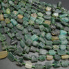 Roman Glass green nuggets shape beads.
