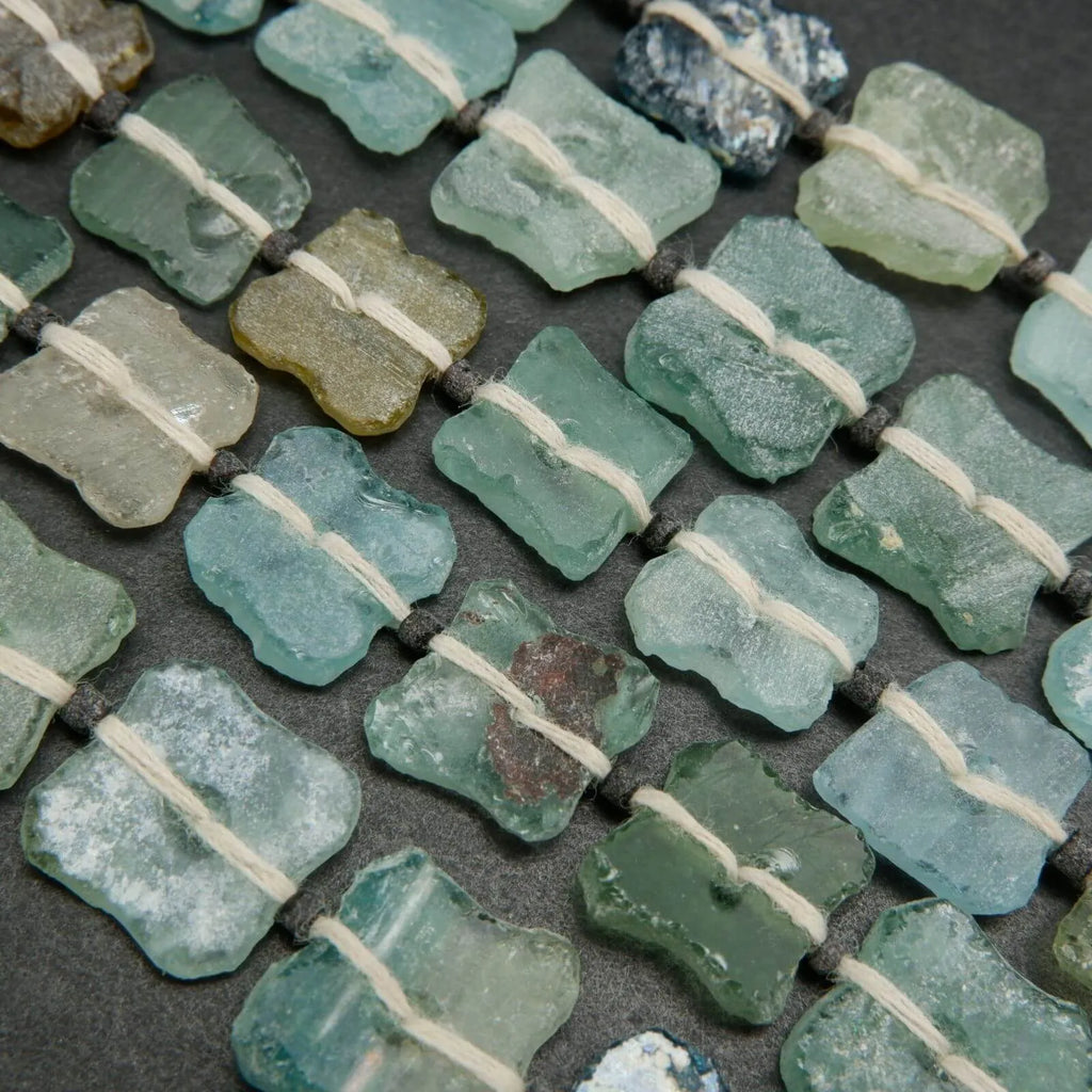 Roman glass clover shape square beads.