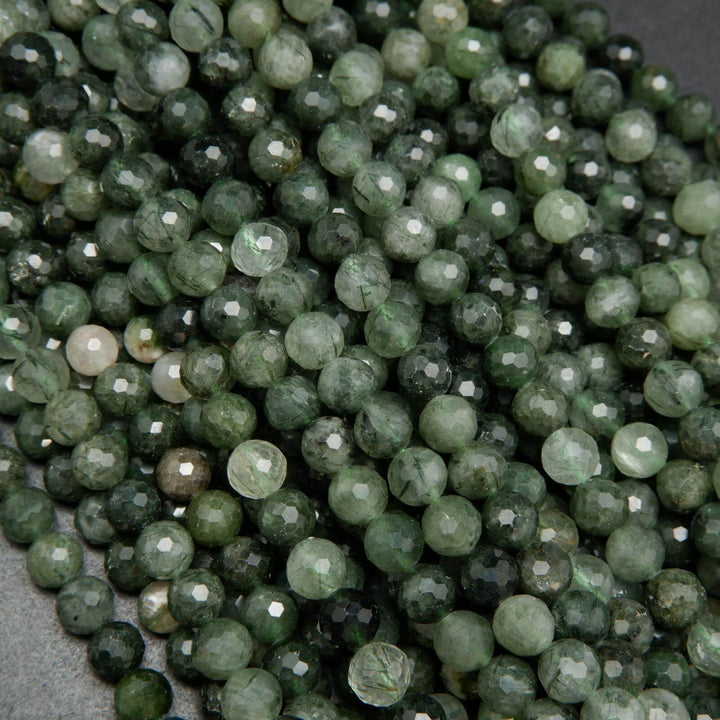 Green rutilated quartz beads.