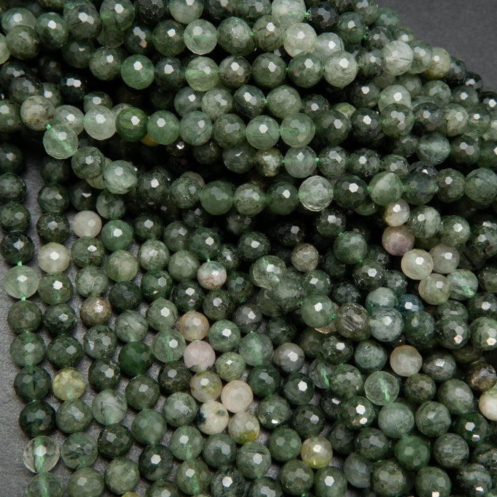 Green rutilated quartz beads.