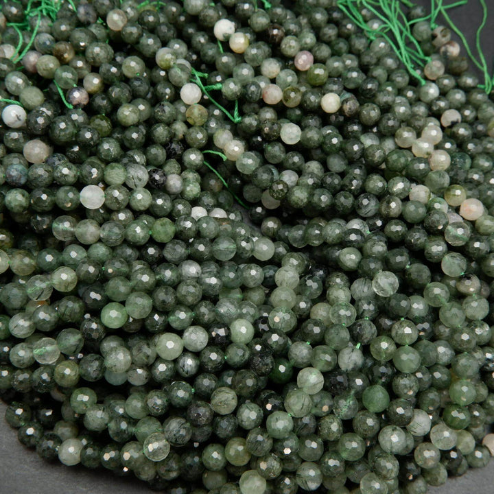 Green rutilated quartz beads.
