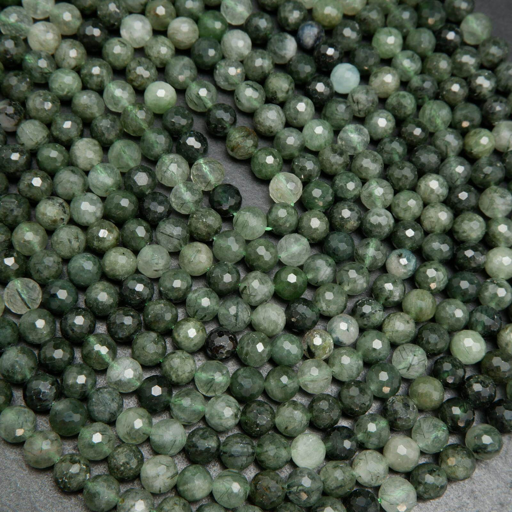 Green rutilated quartz beads.